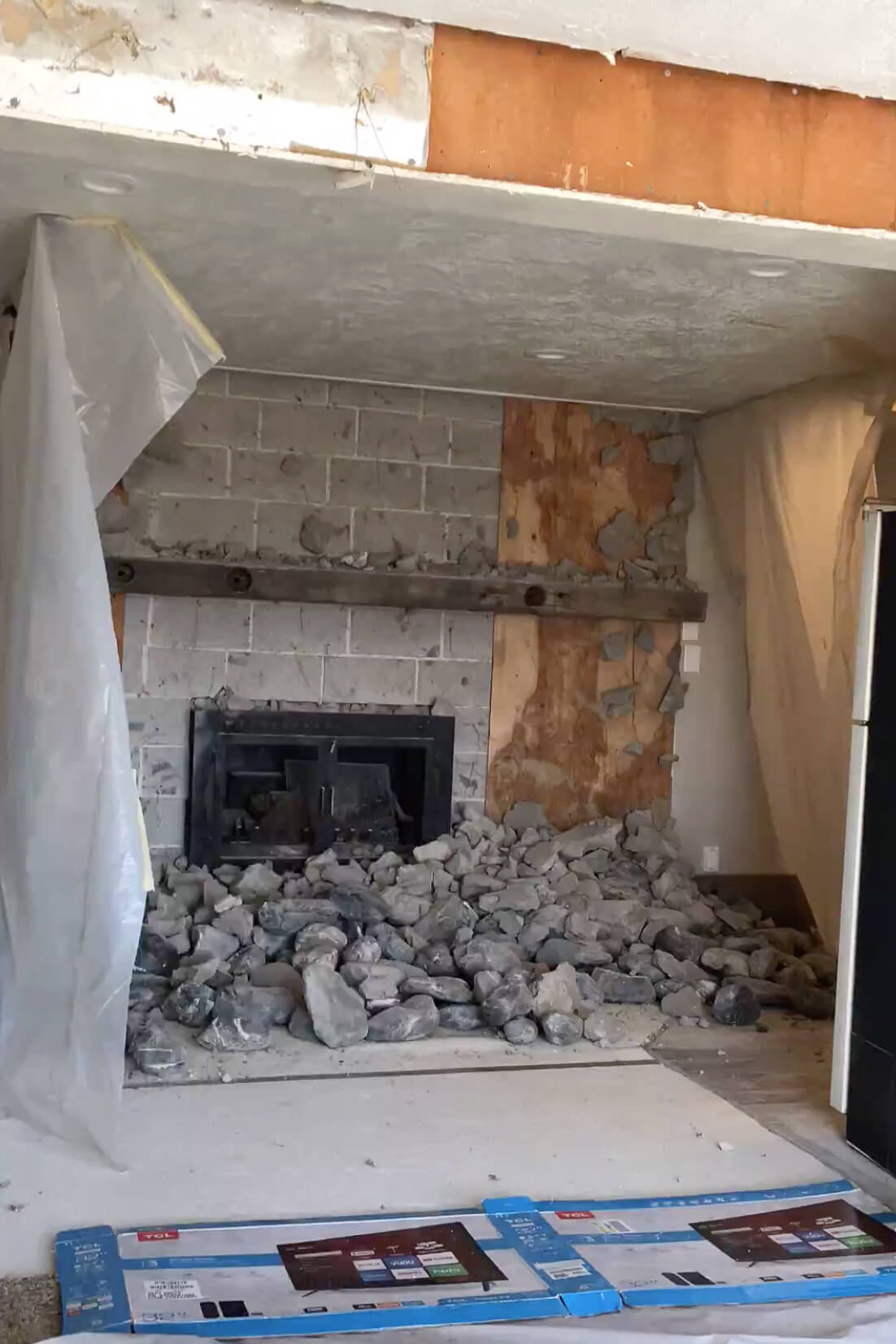 Aftermath of demo on an old rock fireplace.